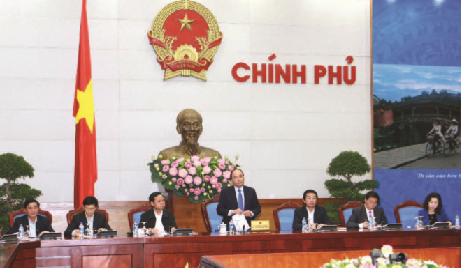Phó Thủ tướng Chính phủ Nguyễn Xuân Phúc phát biểu tại Phiên họp thứ hai của Ban Chỉ đạo Tổng kết 10 năm thực hiện Luật PCTN, ngày 22-12-2015. (Ảnh TTXVN)