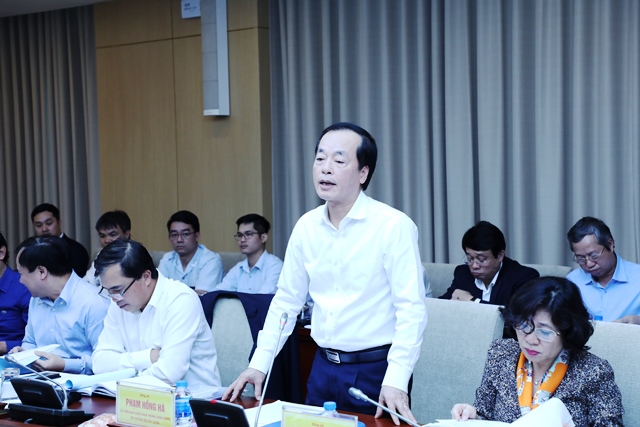 Đồng chí Phạm Hồng Hà, Ủy viên Trung ương Đảng, Bộ trưởng, Bí thư Ban Cán sự đảng Bộ Xây dựng phát biểu tại buổi làm việc