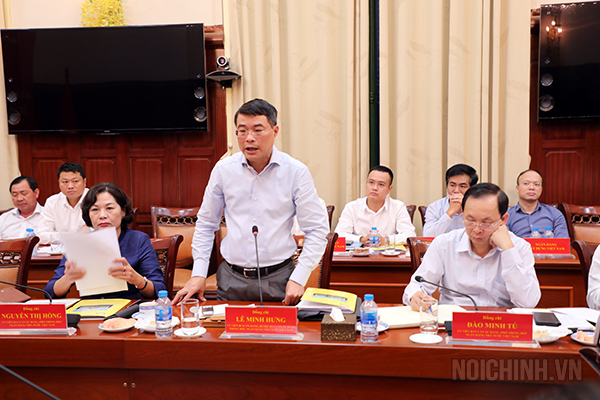 Đồng chí Lê Minh Hưng, Ủy viên Trung ương Đảng, Bí thư Ban cán sự, Thống đốc Ngân hàng Nhà nước Việt Nam phát biểu tại Hội nghị